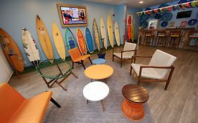 Golden Tulip Guarujá - Antigo Delphin Surf Hotel